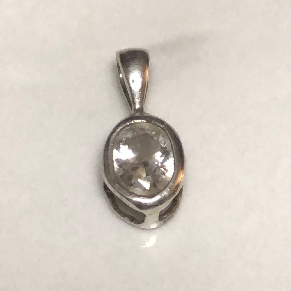 Oval‎ CZ in 925 sterling silver basket setting